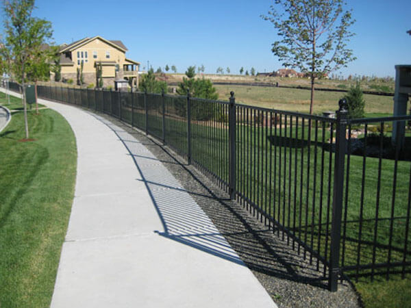 Custom fence along patio walkway