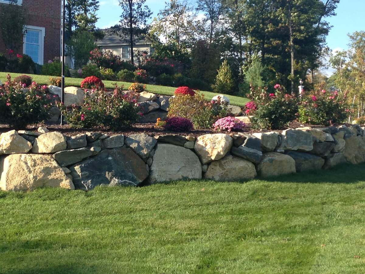 Retaining wall with flowerbeds
