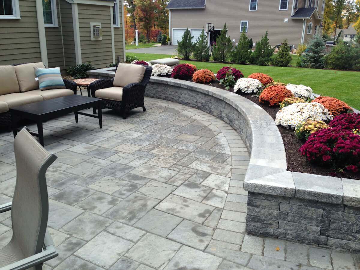 patio with hardscaping and flowerbed